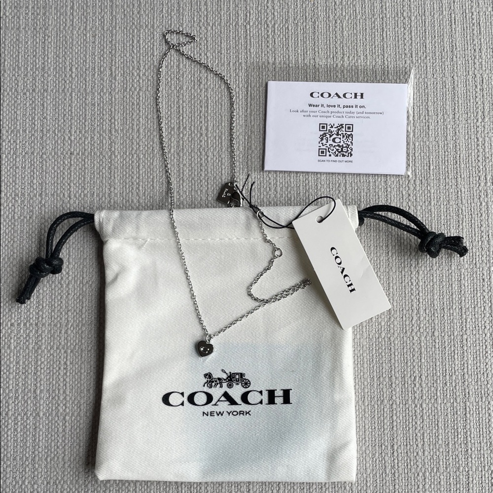 COACH Necklace with Heart-Shaped Pendant in Silver  with pouch